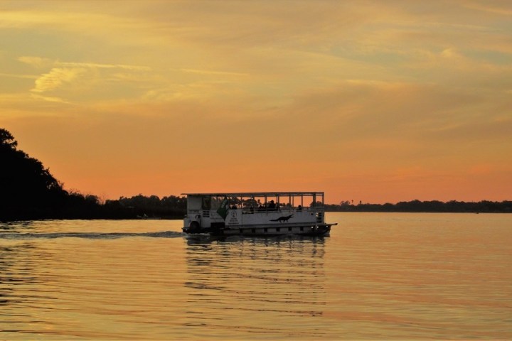 a boat traveling across a large body of water